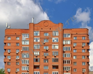 Кирпичный жилой дом