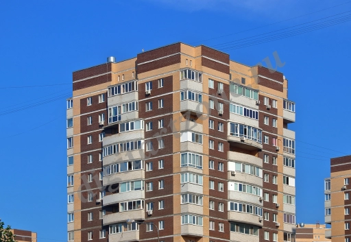 Кирпичный жилой дом