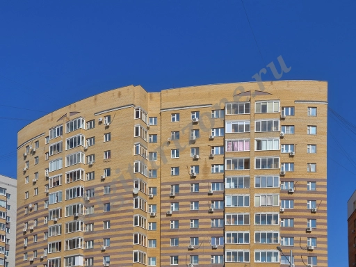 Кирпичный жилой дом